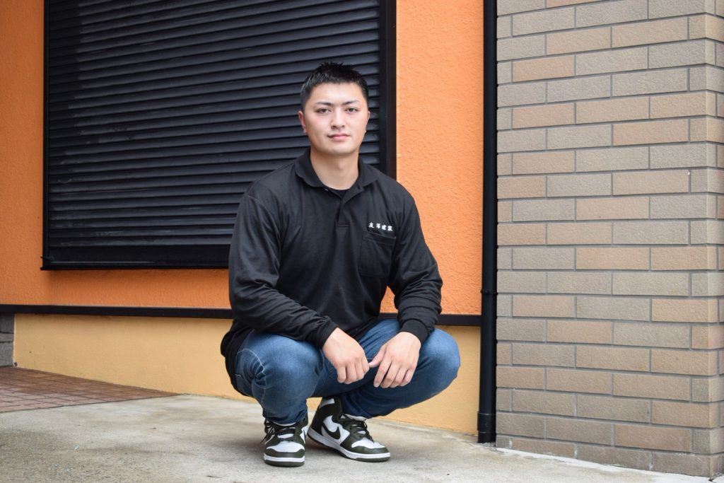 友澤建装代表